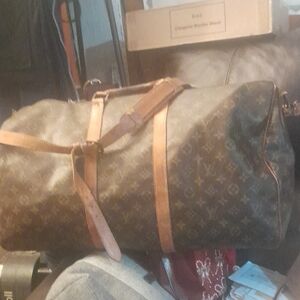 LV 55 Monogram Duffel Bag